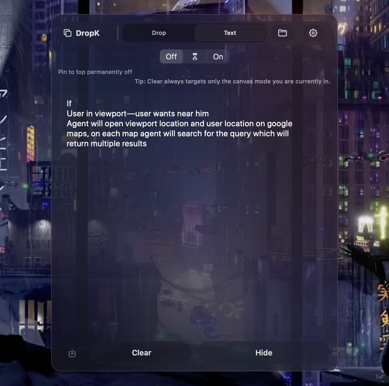 DropK shelf floating over a night-time city skyline desktop.